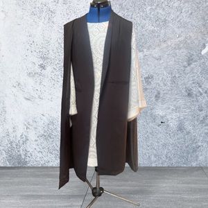 Black sleeveless cape/jacket! Haoduoyl designs.